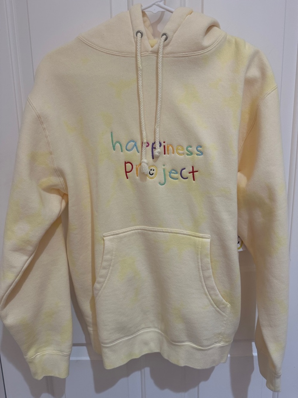 New with tags. Happiness project hoodie.
Size S. Yellow tie dye on yellow